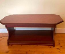 Elegant Dark Wood Coffee Table with Handy Storage Shelf