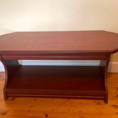 Elegant Dark Wood Coffee Table with Handy Storage Shelf