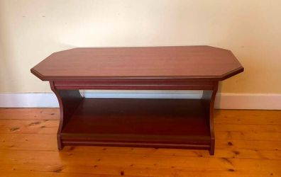 Elegant Dark Wood Coffee Table with Handy Storage Shelf