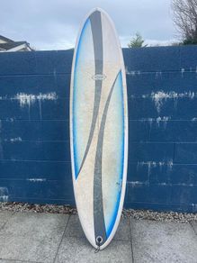 Surfboard - Circle one 6ft 11 board