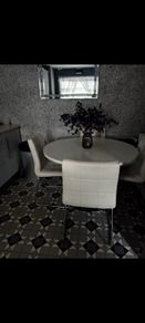 Table and 4 Leather Chairs