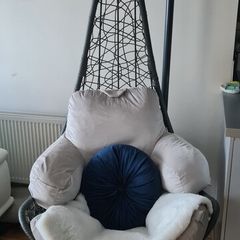 egg chair, original outdoor grey cushion. Including extra cushions & throw. Used indoors. Will include large and small cushion and fake throw