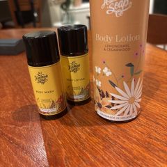 Brand new The Handmade Company- Lemongrass and Cedarwood Body Lotion and 2 Free Travel size Body Wash and Body Lotion