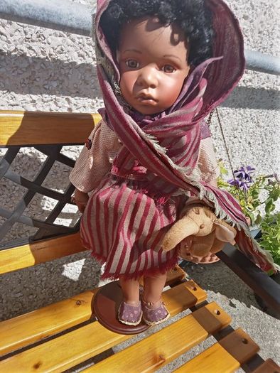 Beautiful Porcelain Doll with Soft Toy Elephant