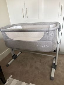 Co-sleeper crib with fold down side and travel bag