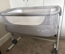 Co-sleeper crib with fold down side and travel bag
