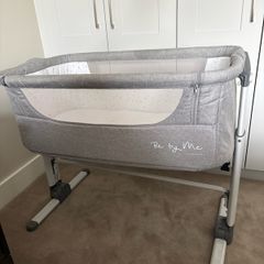 Co-sleeper crib with fold down side and travel bag
