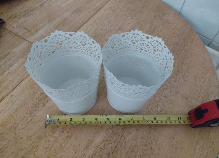 Two metal plantpots / plantpot holders