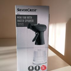 Brand New Mini Handheld Fan with Water Misting Sprayer