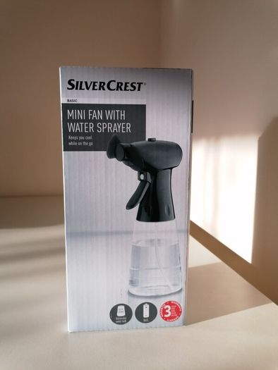 Brand New Mini Handheld Fan with Water Misting Sprayer