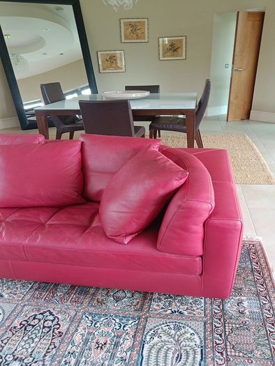 Natuzzi red leather corner sofa or can be separate as shown