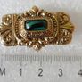 Vintage gold tone brooch with Green Faceted Stone Image 7