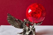 Crackle glass ball and metal angle base.