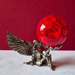 Crackle glass ball and metal angle base.