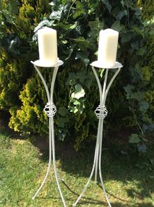 2 tall candle stands & candles