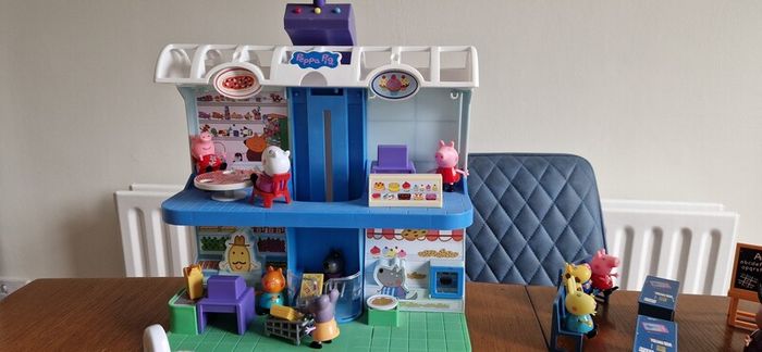 Assortment of peppa pig toys