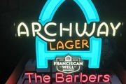 neon sign the barbers
