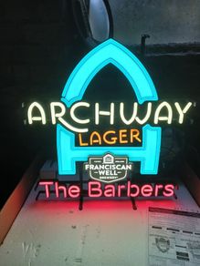 neon sign the barbers