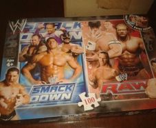 WWE Wrestling Rings & Jigsaw.