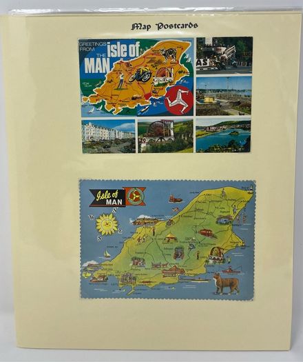 24 Beautifully written up Isle of Man display pages with lots of postcards and stamps. Maps, IOM TT and Manx cat noted