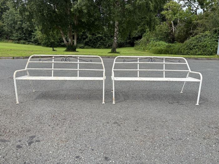 A matching pair of vintage tubalar steel garden benchs c1950