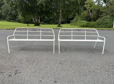 A matching pair of vintage tubalar steel garden benchs c1950