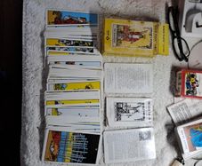 3 complete tarot cards sets.