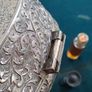 Vintage chased jewellery box and bottles Image 9