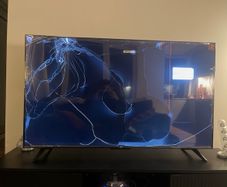 Broken 55" TV (Brand new, damaged in delivery)