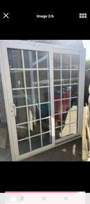White uPVC sliding patio doors with Georgian bars