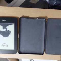 Amazon Kindle Model DP75SDI, in leather case, excellent cosmetic condition, not powering up, for parts or repair