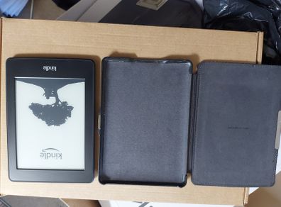 Amazon Kindle Model DP75SDI, in leather case, excellent cosmetic condition, not powering up, for parts or repair