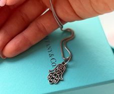 Silver charm Hand