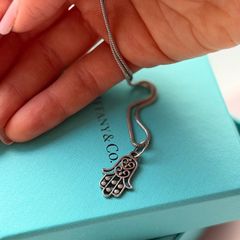 Silver charm Hand