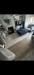 Cream rug with grey border