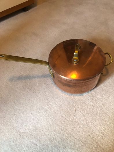 Vintage castle copper saucepans