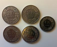 9 Swiss Francs