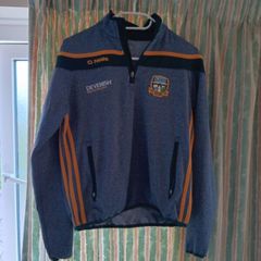 O'Neills Meath GAA Zip Top. Age 13. Width 47cm, Length 54cm. Very Good Condition. Price Includes Postage.