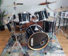 Tama 5-piece black Drum Kit with Zildjian cymbals and drum cases.