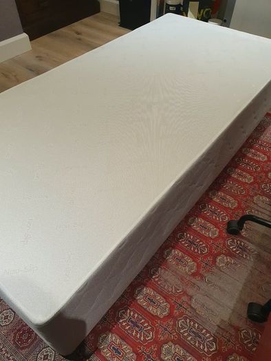Single divan bed with pristine clean mattress and space for headboard