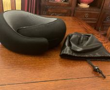 Travel  neck support pillow Reduced in black with a storage bag