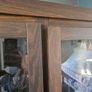 Dark wood glass cabinet Image 4