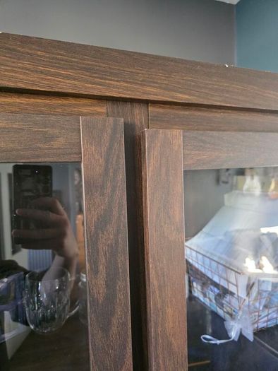 Dark wood glass cabinet