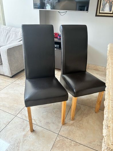 4 brown leather chairs