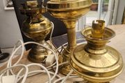 Three oil brass lamps