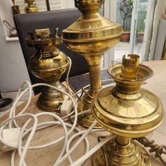 Three oil brass lamps