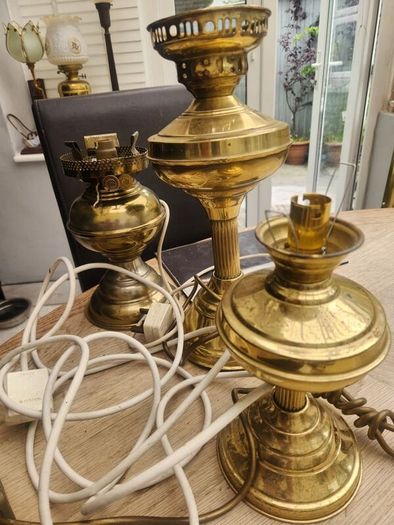 Three oil brass lamps