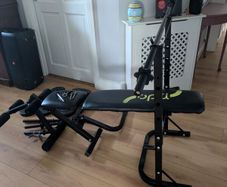weight bench with weights and bars