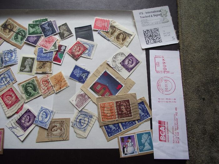 A box with collection of stamps from Great Britain