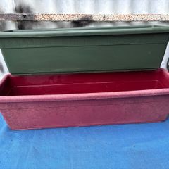 Pair of plastic window boxes